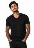 Close-up of a male model wearing a black V-neck T-shirt, highlighting the neckline, fit and smooth finish of the fabric.