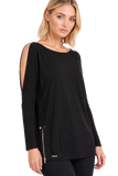 Model wearing the BLACKPANTS Open Shoulder Drape Top in black, featuring a boat neckline, cold shoulder detail, long sleeves and side zip accent.