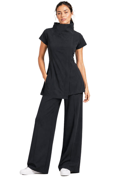 BLACKPANTS Soho Tunic styled with The Chelsea Pant, showcasing the high zipped neckline and tailored silhouette