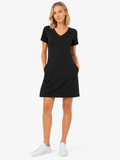 BLACKPANTS T-Dress styled with white sneakers showing relaxed fit and side pockets